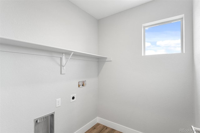 laundry room featuring hardwood / wood-style floors, electric dryer hookup, and hookup for a washing machine