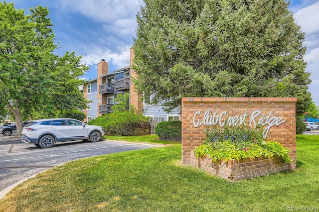 7881 Allison Way Unit 303, Arvada, CO 80005 - community sign featuring a yard and uncovered parking