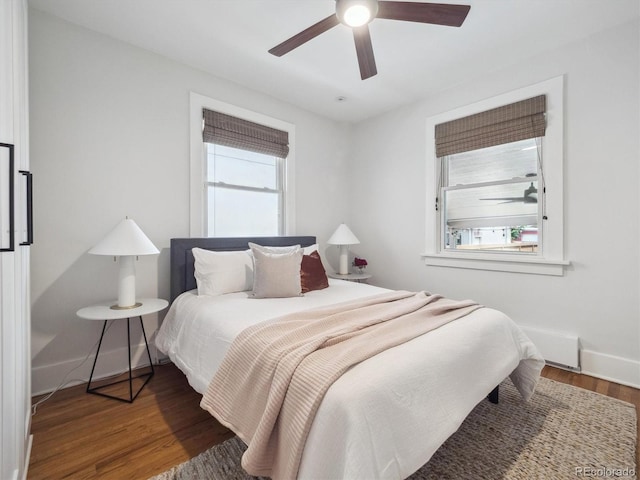 660 S Clarkson St, Denver, CO 80209 - bedroom featuring wood finished floors, baseboards, and a ceiling fan
