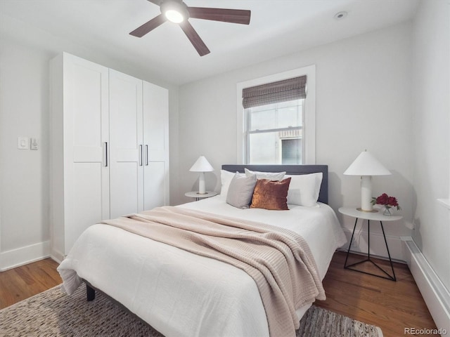 660 S Clarkson St, Denver, CO 80209 - bedroom featuring light wood-style flooring, baseboards, and a ceiling fan