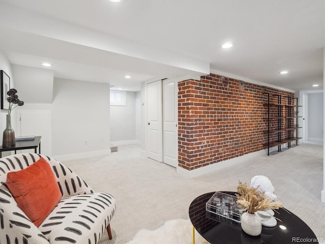 660 S Clarkson St, Denver, CO 80209 - living room with light carpet, recessed lighting, baseboards, and brick wall