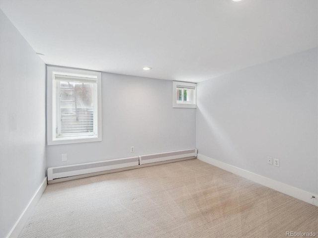 660 S Clarkson St, Denver, CO 80209 - unfurnished room with baseboard heating, carpet floors, and baseboards