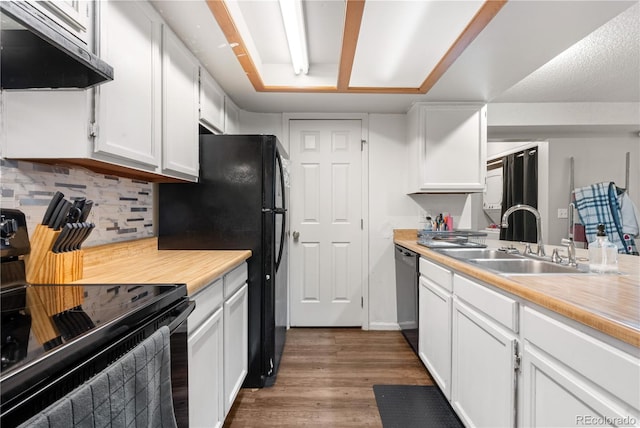 16001 E Alaska Pl Unit 12, Aurora, CO 80017 - kitchen featuring under cabinet range hood, black appliances, and light countertops