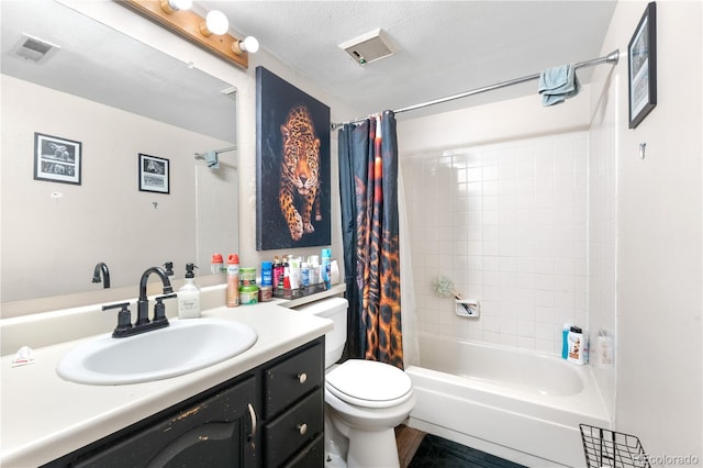 16001 E Alaska Pl Unit 12, Aurora, CO 80017 - bathroom featuring vanity and shower / bath combo with shower curtain