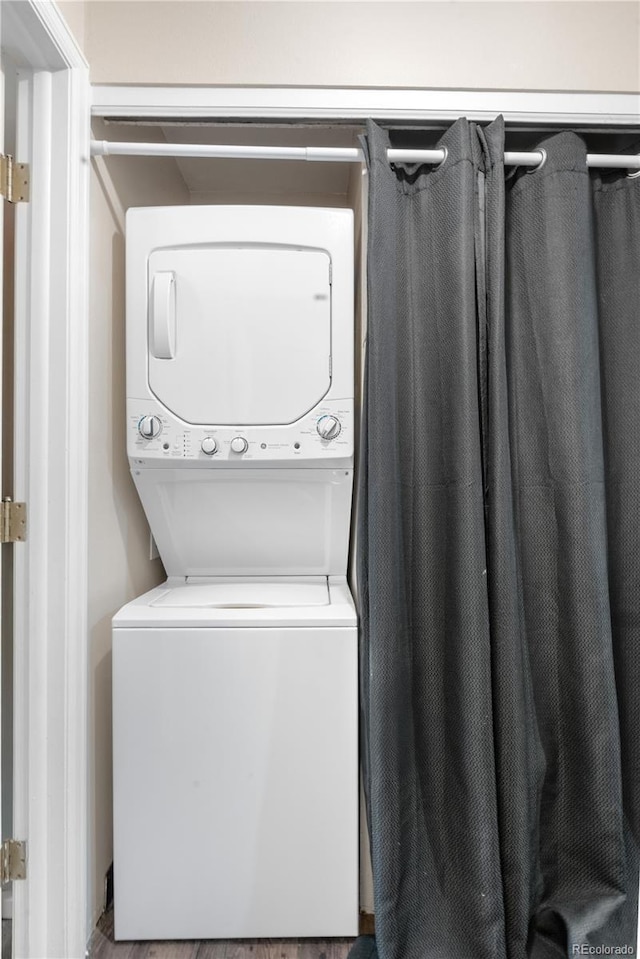 16001 E Alaska Pl Unit 12, Aurora, CO 80017 - laundry room with stacked washer / drying machine