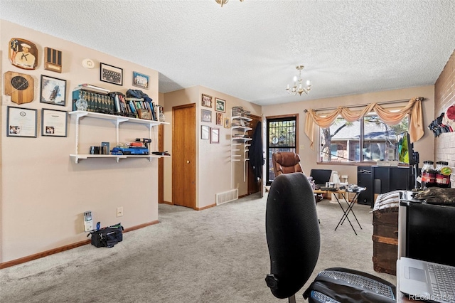 office with visible vents, baseboards, light carpet, an inviting chandelier, and a textured ceiling