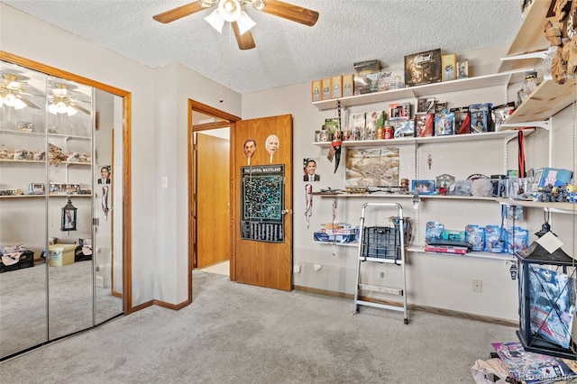 interior space featuring ceiling fan