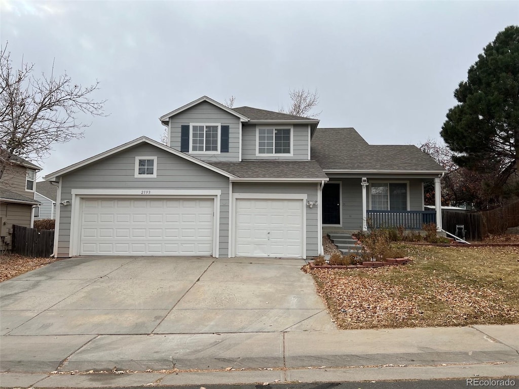 front facade featuring a garage and a porch