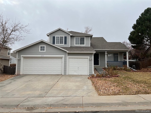 front facade featuring a garage and a porch