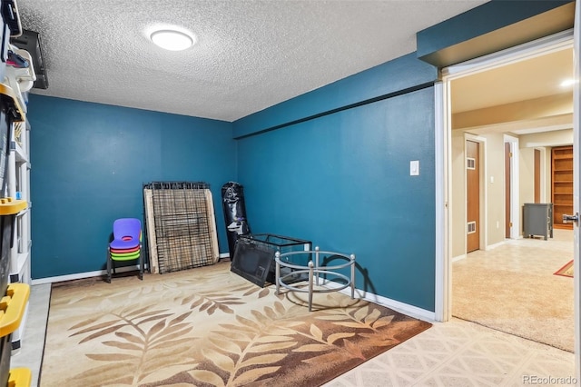 7925 W Layton Ave Unit 500, Littleton, CO 80123 - carpeted bedroom with a textured ceiling and baseboards