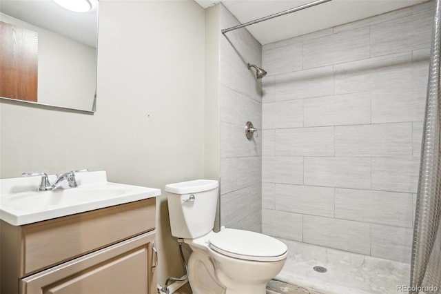7925 W Layton Ave Unit 500, Littleton, CO 80123 - full bathroom with a tile shower, toilet, and vanity