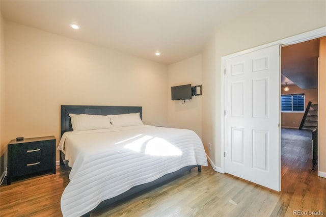 bedroom featuring hardwood / wood-style flooring