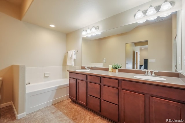 bathroom featuring a bathing tub and vanity