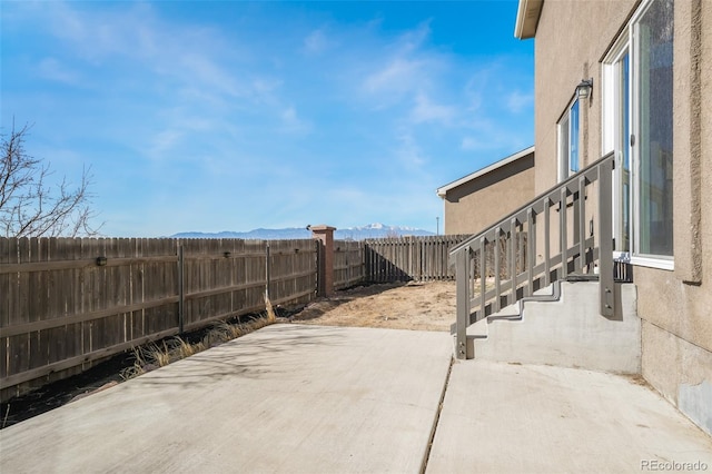 view of patio featuring a mountain view