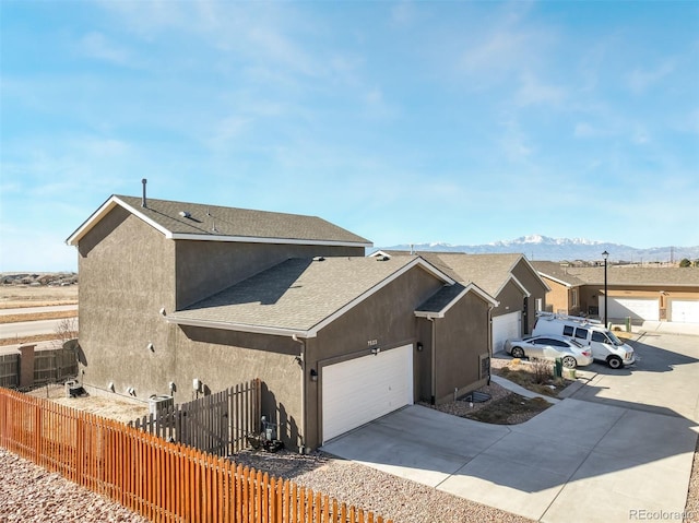 view of front facade featuring a mountain view