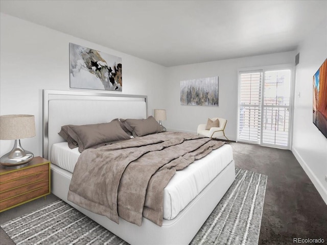 carpeted bedroom featuring access to exterior and baseboards