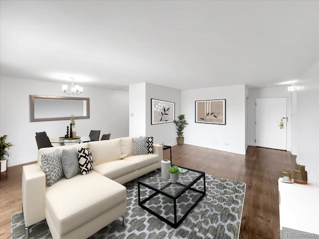 living area with wood finished floors and a chandelier