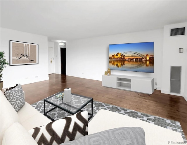 living area with wood finished floors