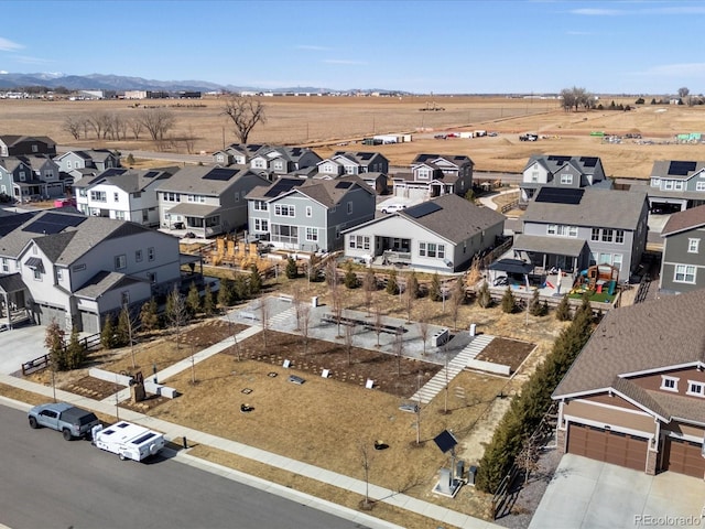 bird's eye view with a mountain view and a residential view