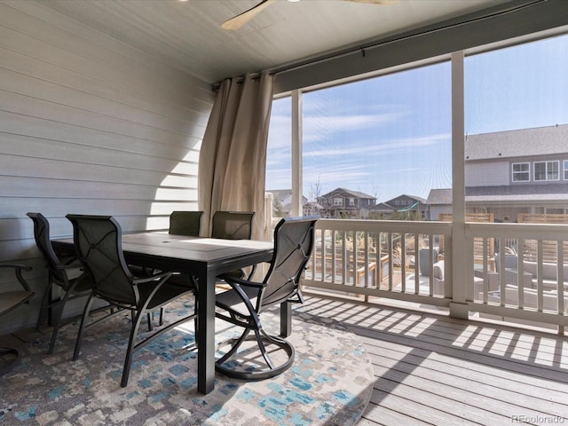 sunroom with a residential view