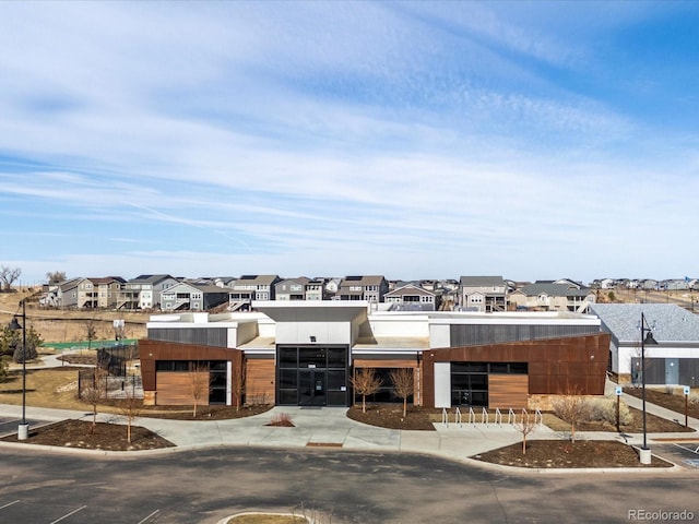 view of property with a residential view