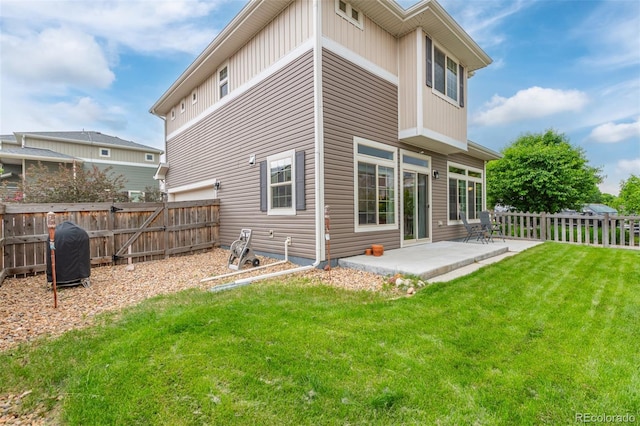 18112 E 104th Way, Commerce City, CO 80022 - rear view of house featuring a patio area