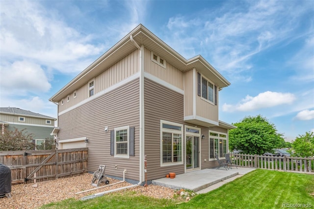 18112 E 104th Way, Commerce City, CO 80022 - back of house with a patio