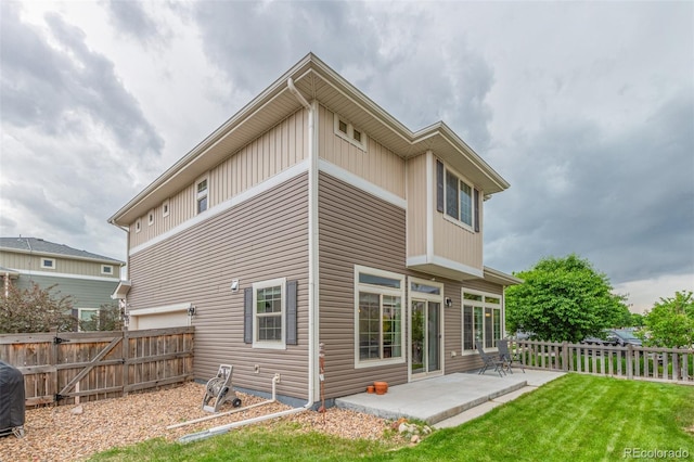 18112 E 104th Way, Commerce City, CO 80022 - back of house with a patio