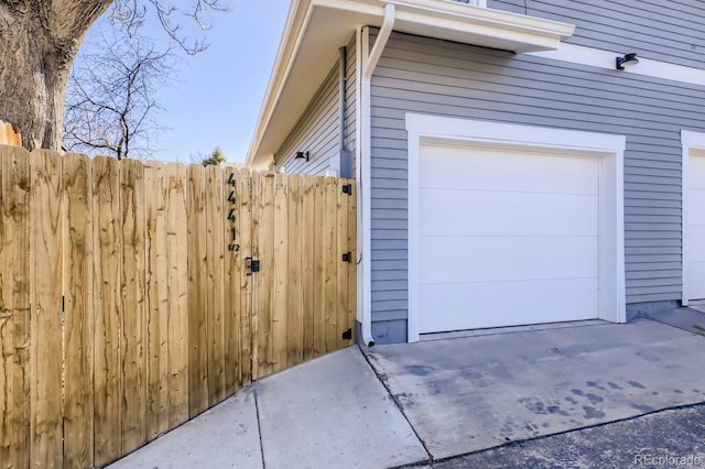 garage with fence