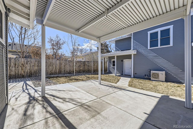 view of patio / terrace with ac unit and fence