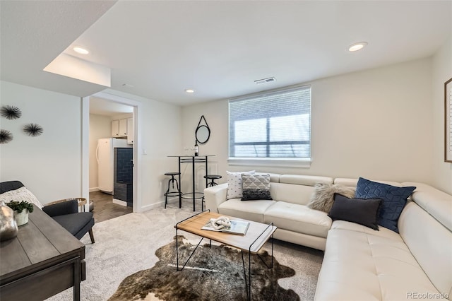 4441 N Meade St, Denver, CO 80211 - living area with visible vents, recessed lighting, carpet, and baseboards