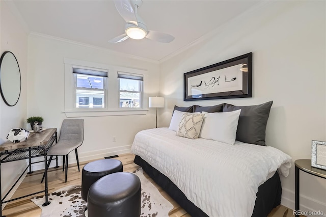4441 N Meade St, Denver, CO 80211 - bedroom with crown molding, a ceiling fan, baseboards, and wood finished floors