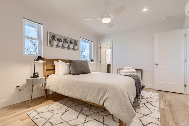 4441 N Meade St, Denver, CO 80211 - bedroom with light wood-style floors, baseboards, ceiling fan, and recessed lighting