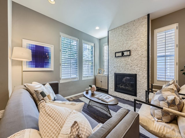 15269 W 69th Cir Unit A, Arvada, CO 80007 - living area featuring wood finished floors, recessed lighting, a fireplace, and lofted ceiling