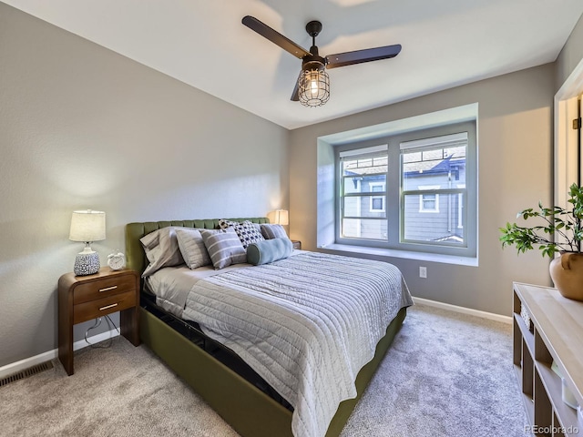 15269 W 69th Cir Unit A, Arvada, CO 80007 - carpeted bedroom with baseboards and ceiling fan