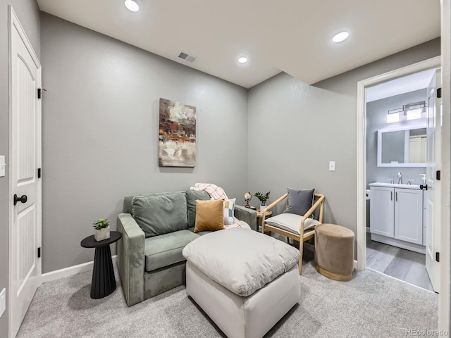 15269 W 69th Cir Unit A, Arvada, CO 80007 - living room featuring recessed lighting and light colored carpet