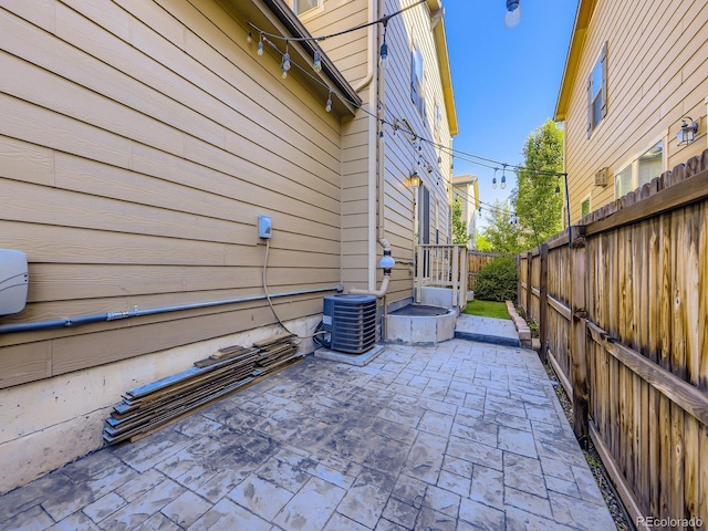 15269 W 69th Cir Unit A, Arvada, CO 80007 - fenced backyard with a patio area