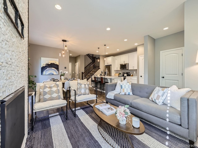 15269 W 69th Cir Unit A, Arvada, CO 80007 - living area with stairs, dark wood finished floors, and recessed lighting