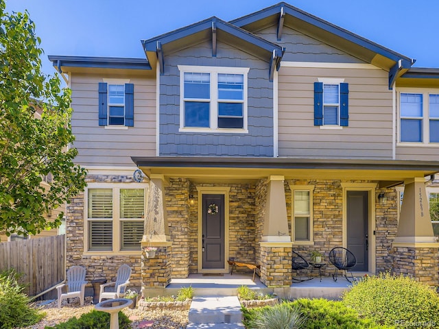 15269 W 69th Cir Unit A, Arvada, CO 80007 - multi unit property featuring covered porch and stone siding