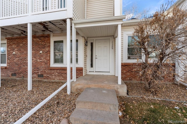 property entrance featuring a balcony