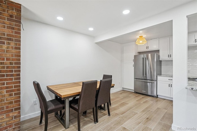 7995 E Mississippi Ave Unit A4, Denver, CO 80247 - dining room featuring baseboards, light wood-type flooring, and recessed lighting