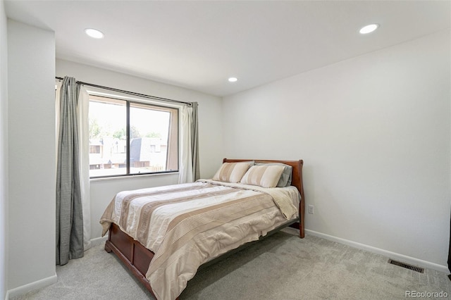 7995 E Mississippi Ave Unit A4, Denver, CO 80247 - bedroom with light colored carpet, recessed lighting, and baseboards