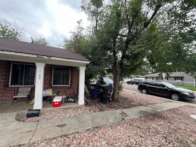 1900 Quebec St, Denver, CO 80220 - view of home's exterior with brick siding
