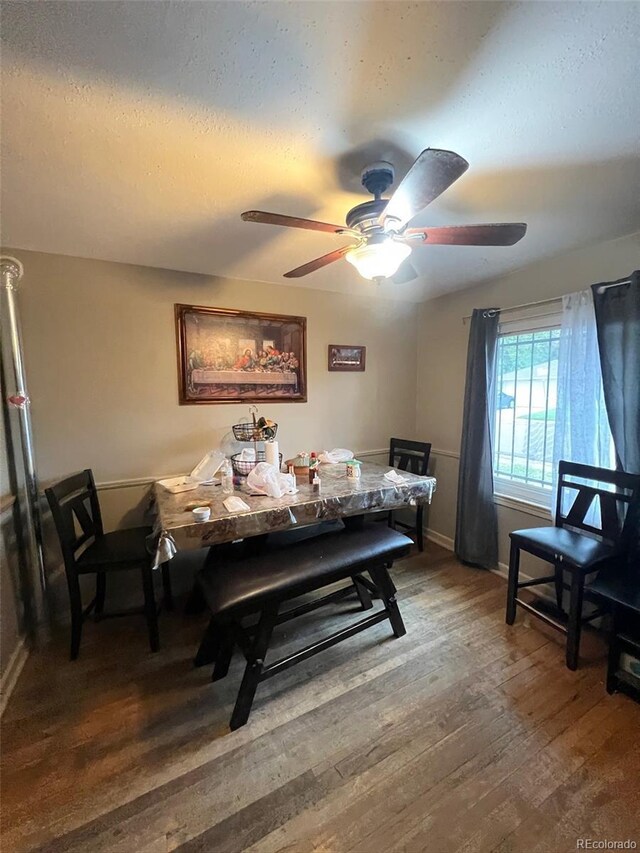 1900 Quebec St, Denver, CO 80220 - dining space featuring hardwood / wood-style floors, ceiling fan, baseboards, and a textured ceiling