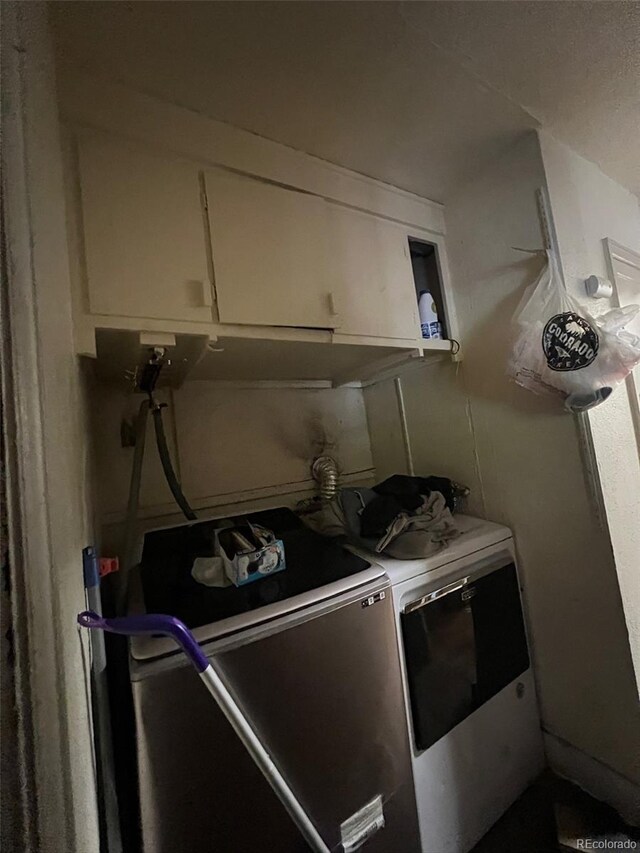 1900 Quebec St, Denver, CO 80220 - laundry room with washing machine and dryer and cabinet space