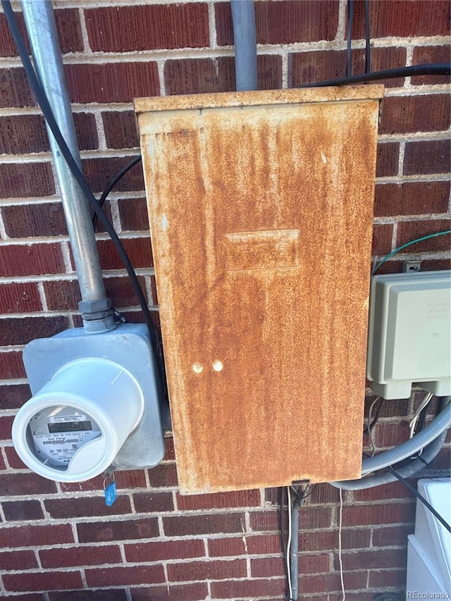 1900 Quebec St, Denver, CO 80220 - exterior view of brick siding and electric meter