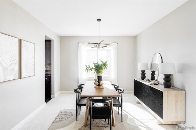 dining room featuring a chandelier