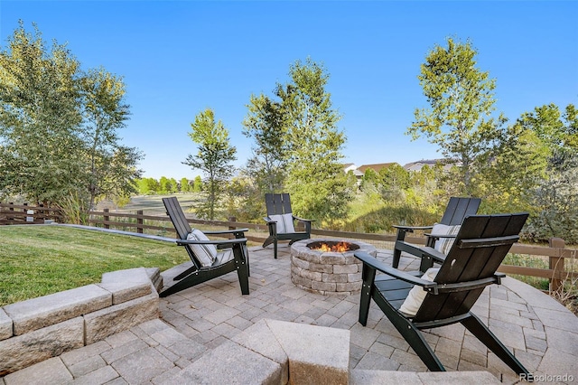 view of patio / terrace with an outdoor fire pit