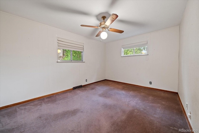 7077 Dudley Dr, Arvada, CO 80004 - carpeted spare room featuring baseboards and a ceiling fan