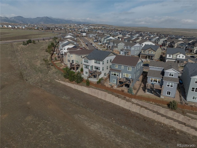 15076 W 93rd Ave, Arvada, CO 80007 - aerial perspective of suburban area with a mountain backdrop